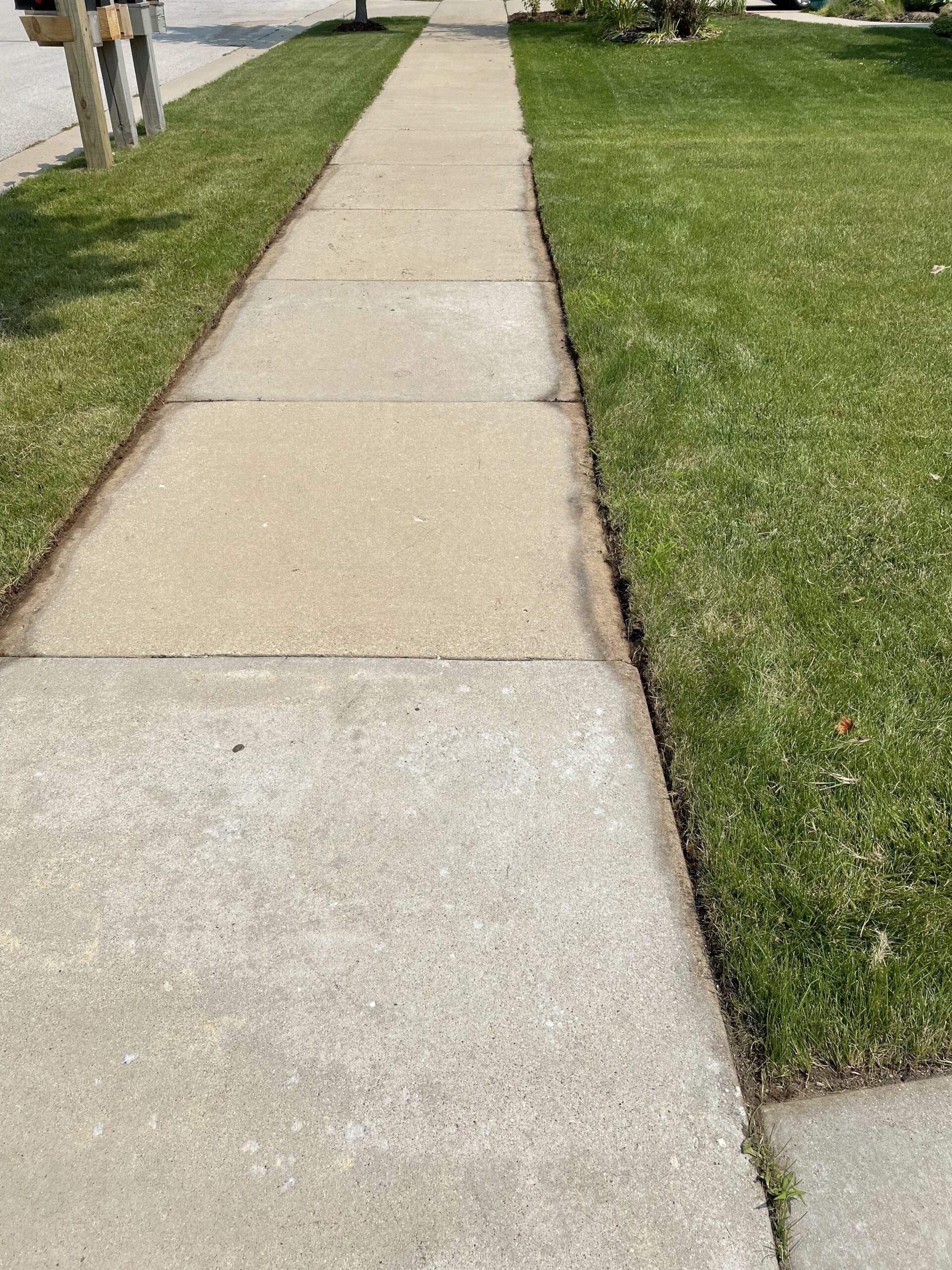 Before and After Sidewalk Edging 2 WoodChucker's Mulch